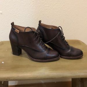 Brown leather booties by Pikolinos